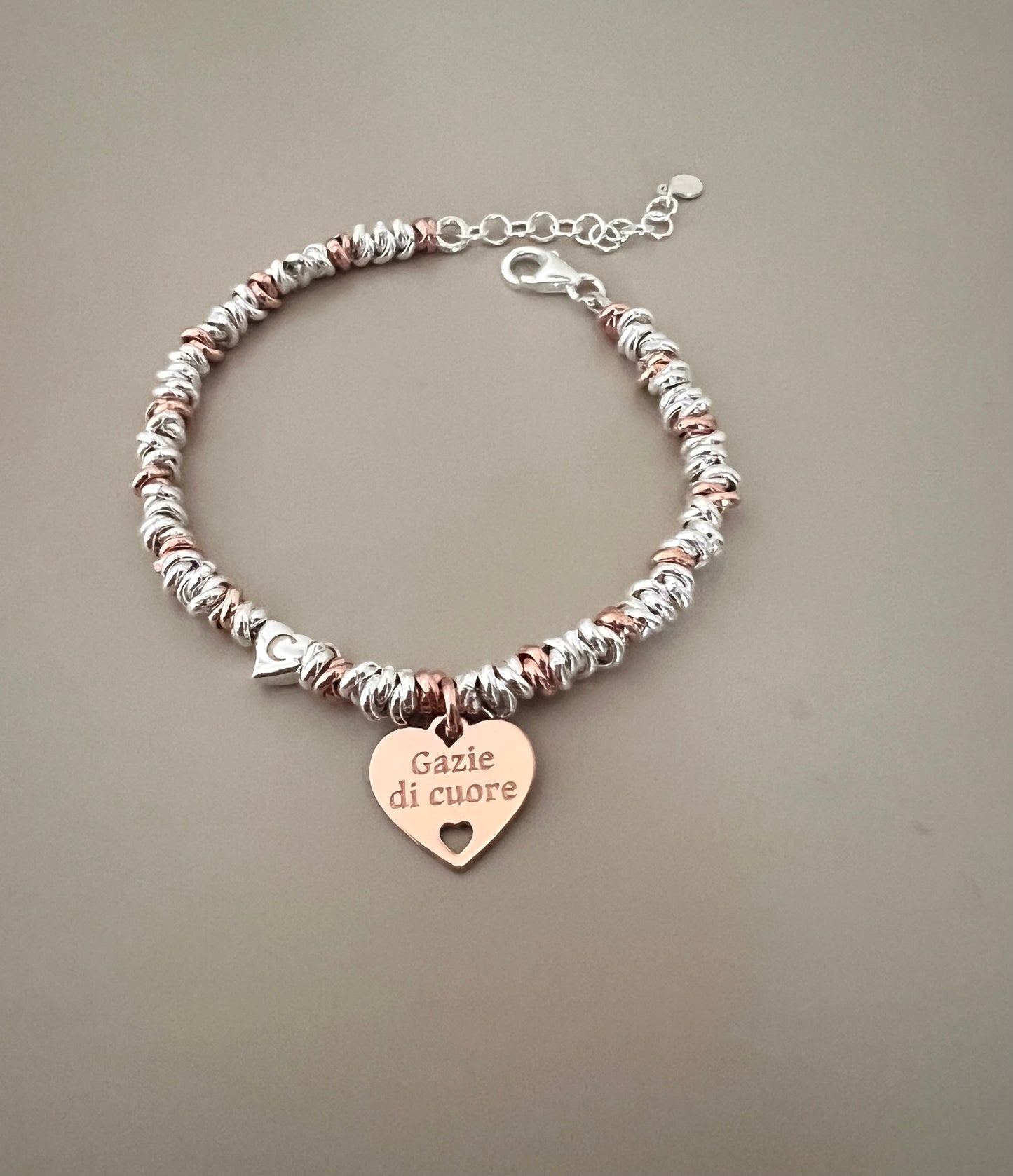Bracciale madrina con un cuore pendente