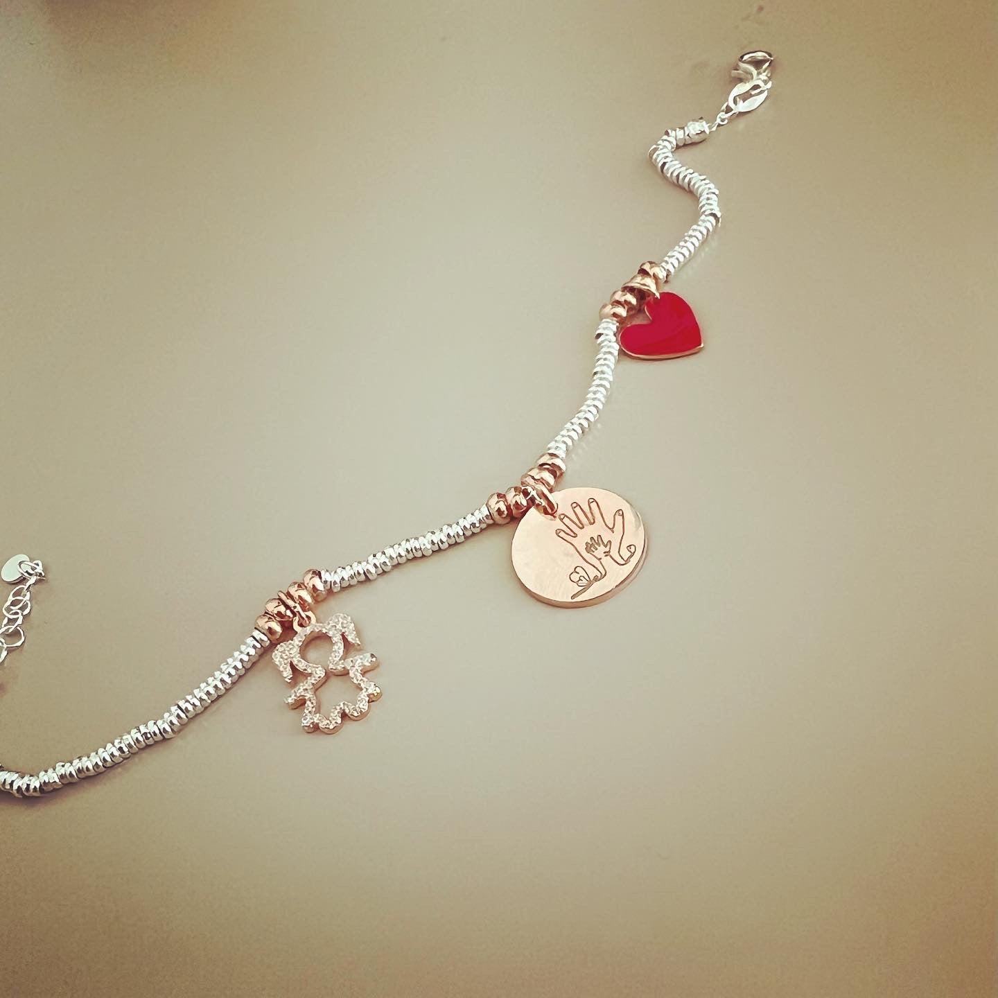 Bracciale bimba cuore mani