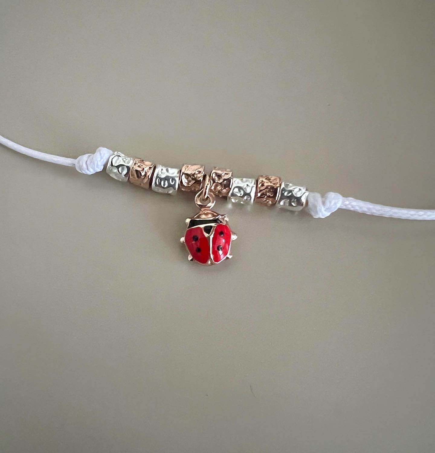 Bracciale cordino pepite e coccinellaa - Filigrane & co