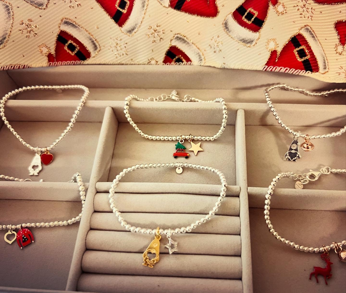 Bracciali sferette argento con ciondoli natalizi