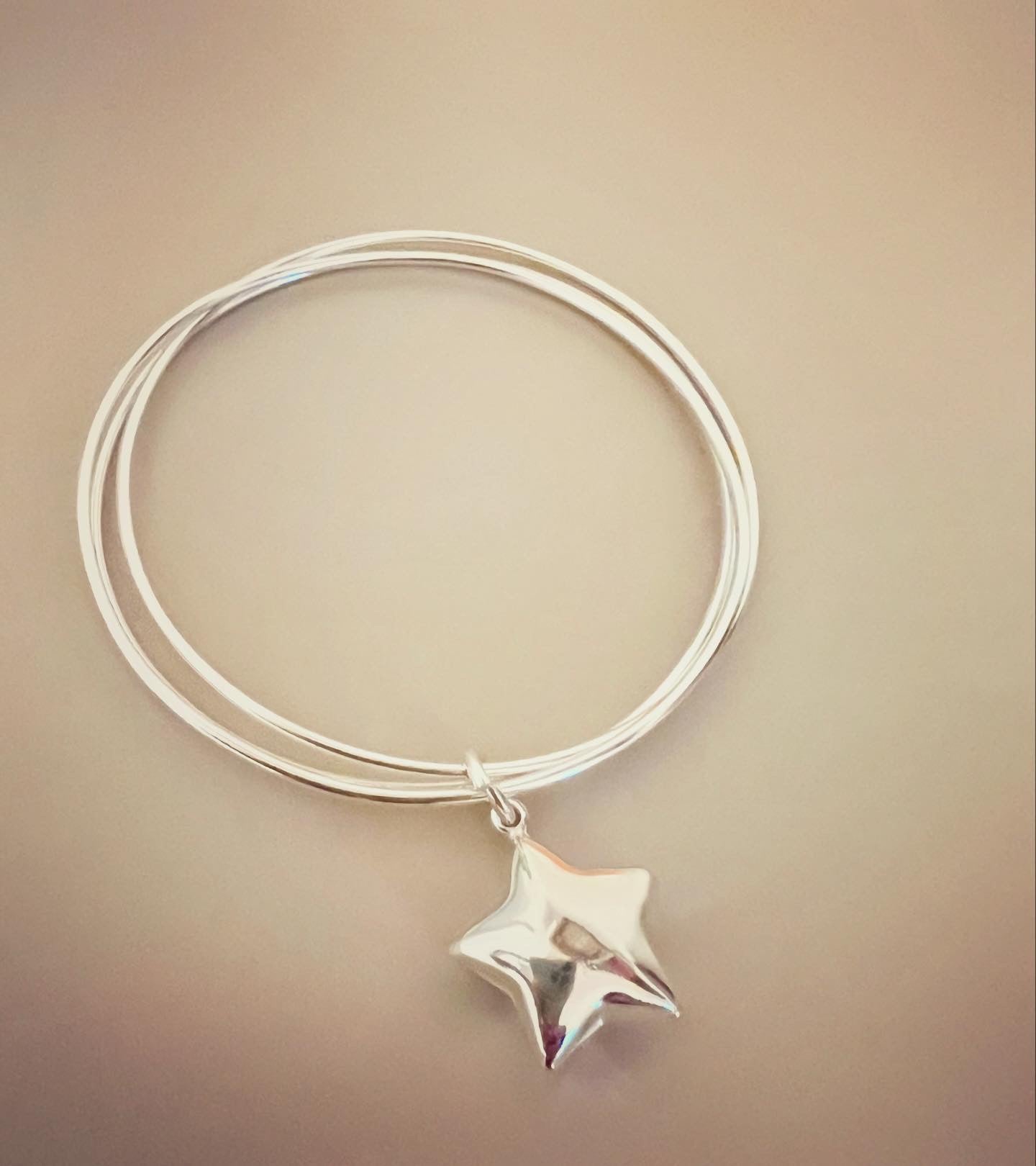 Bracciale tre cerchi sottili con stella bombata - Filigrane & co