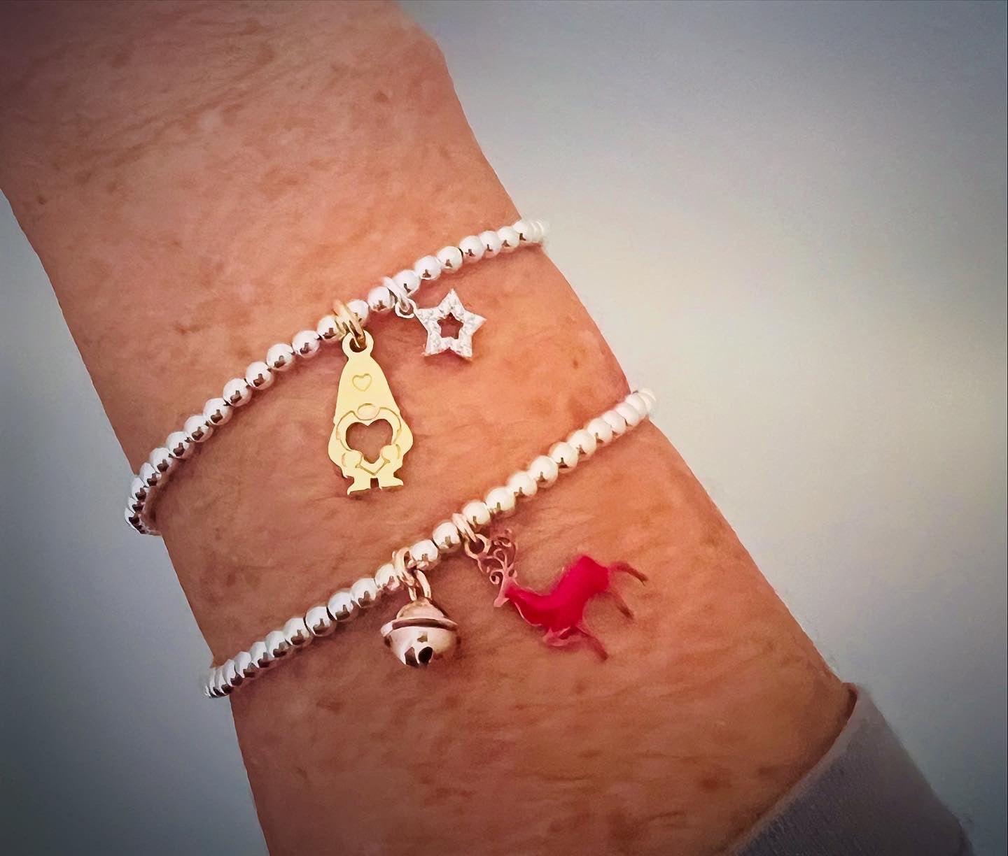 Bracciali sferette argento con ciondoli natalizi