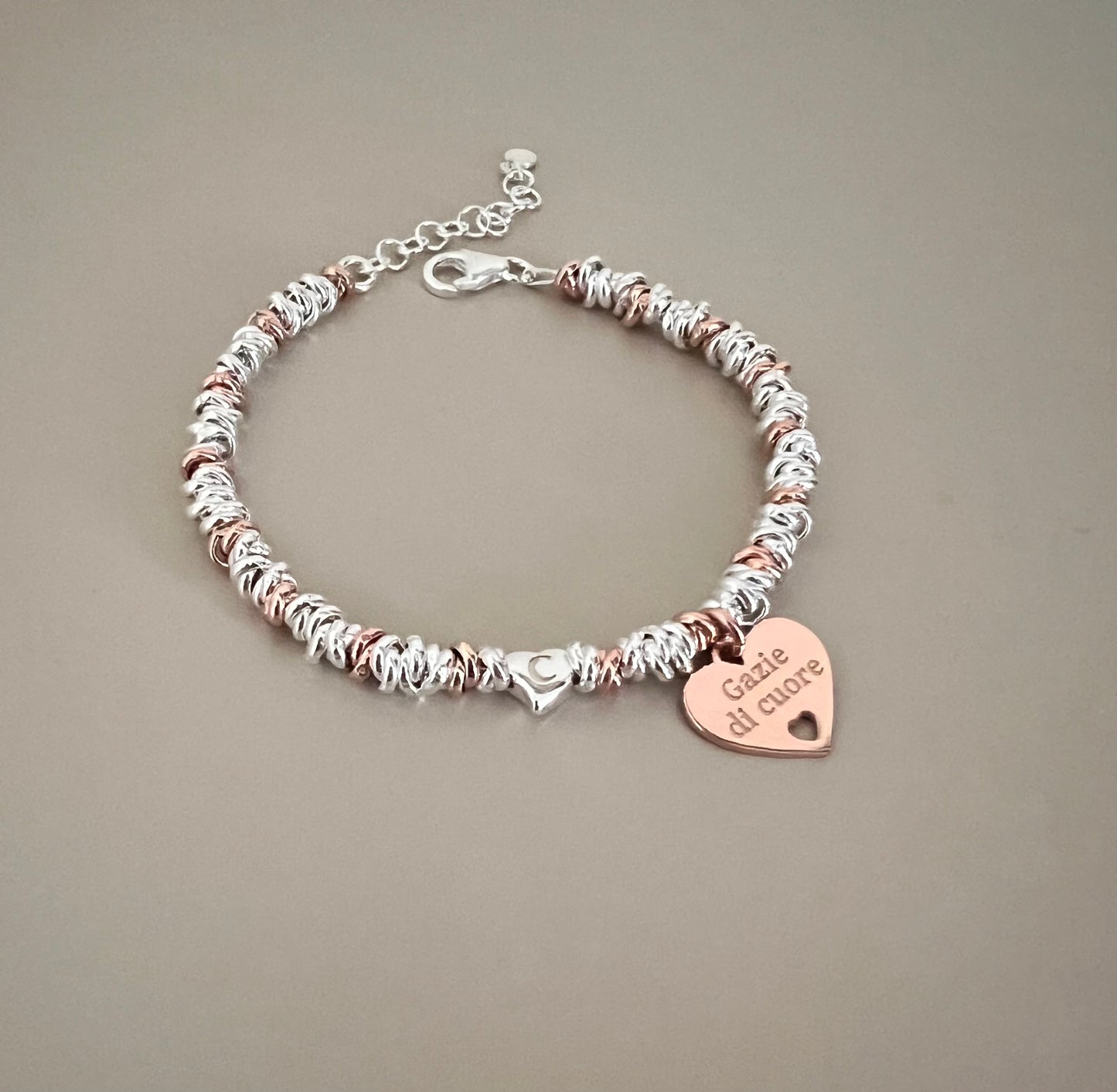 Bracciale madrina con un cuore pendente