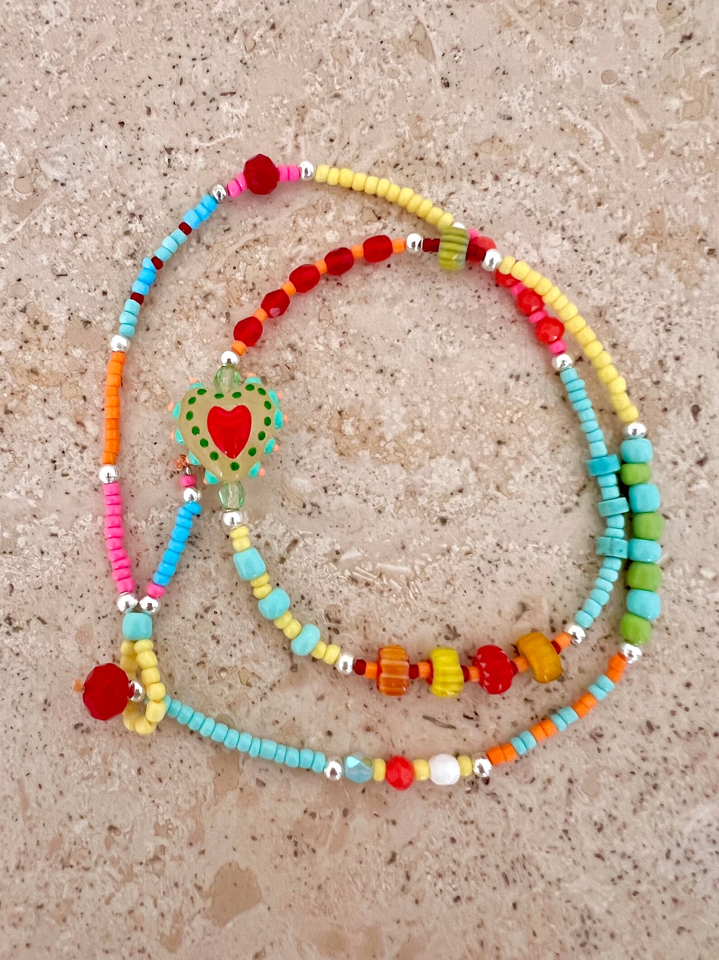 Collane di perline colorate con cuore