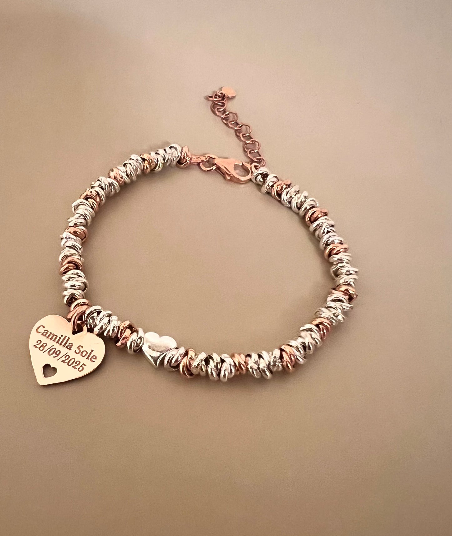 Bracciale madrina con un cuore pendente