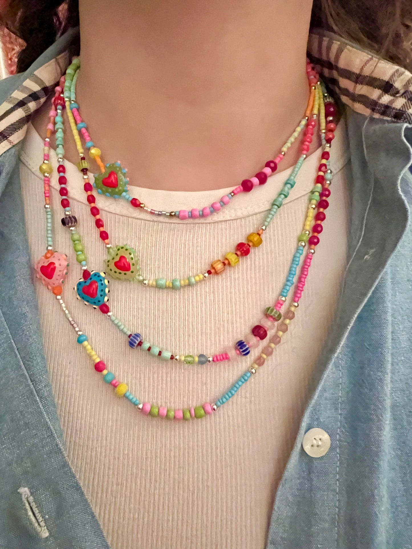 Collane di perline colorate con cuore