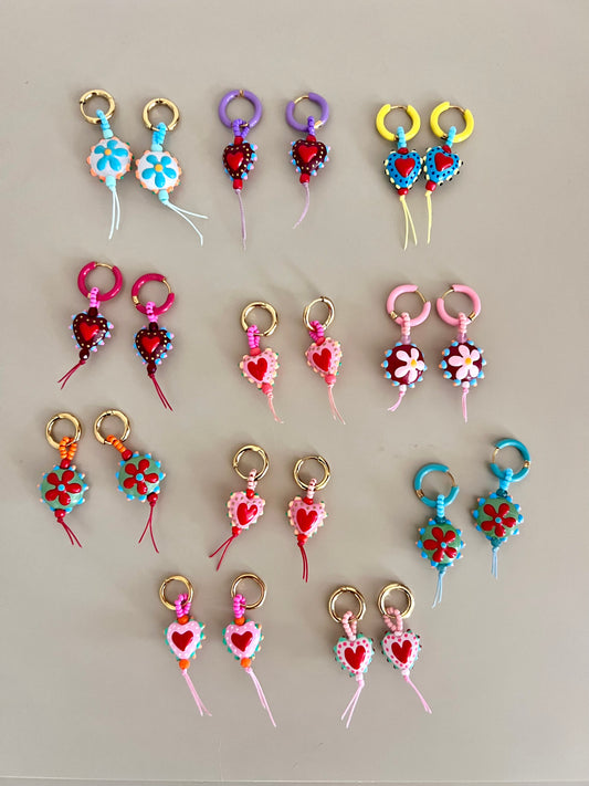 Orecchini a cerchio con cuori pendenti - Filigrane & co