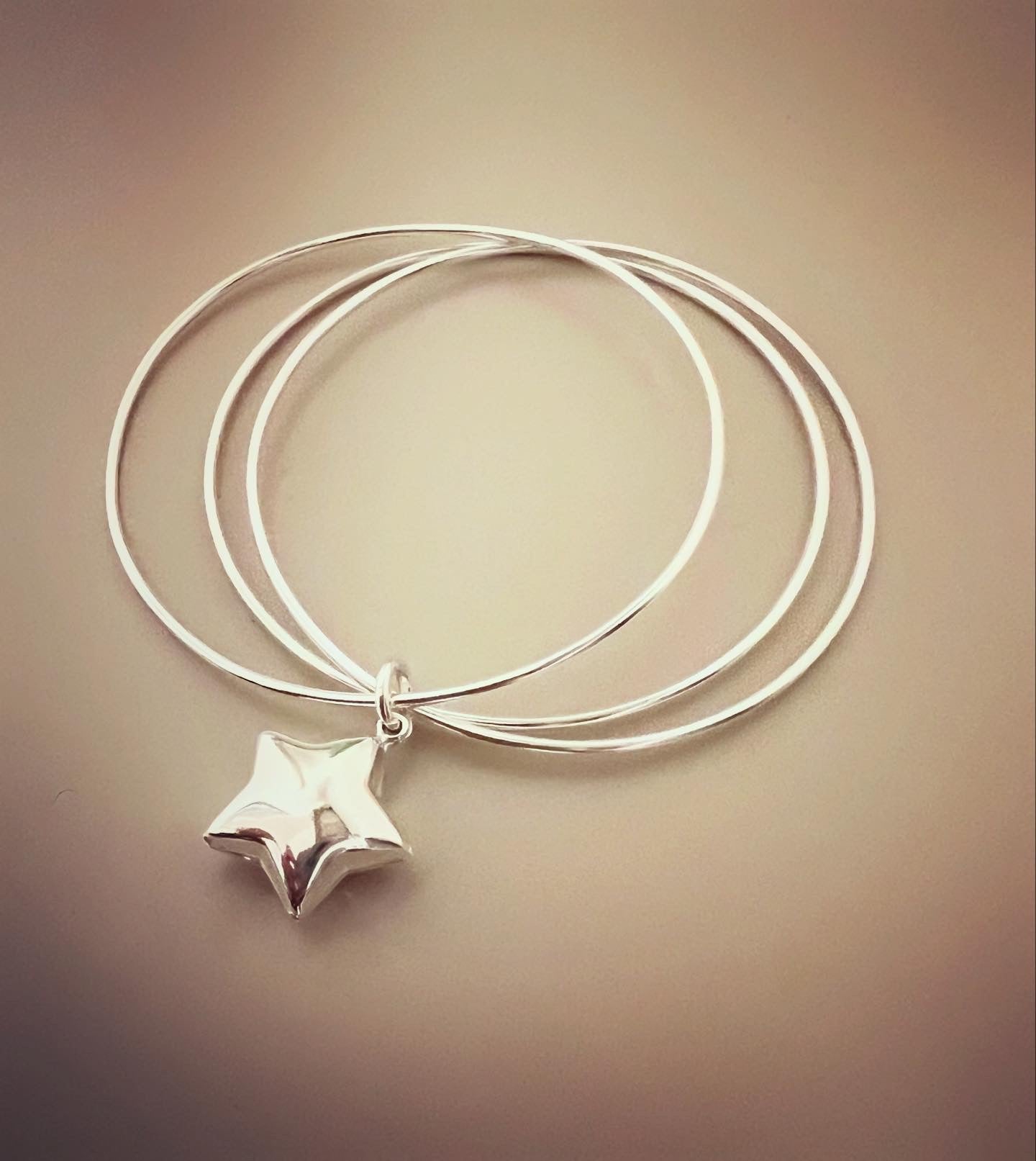 Bracciale tre cerchi sottili con stella bombata - Filigrane & co