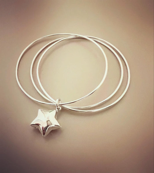 Bracciale tre cerchi sottili con stella bombata