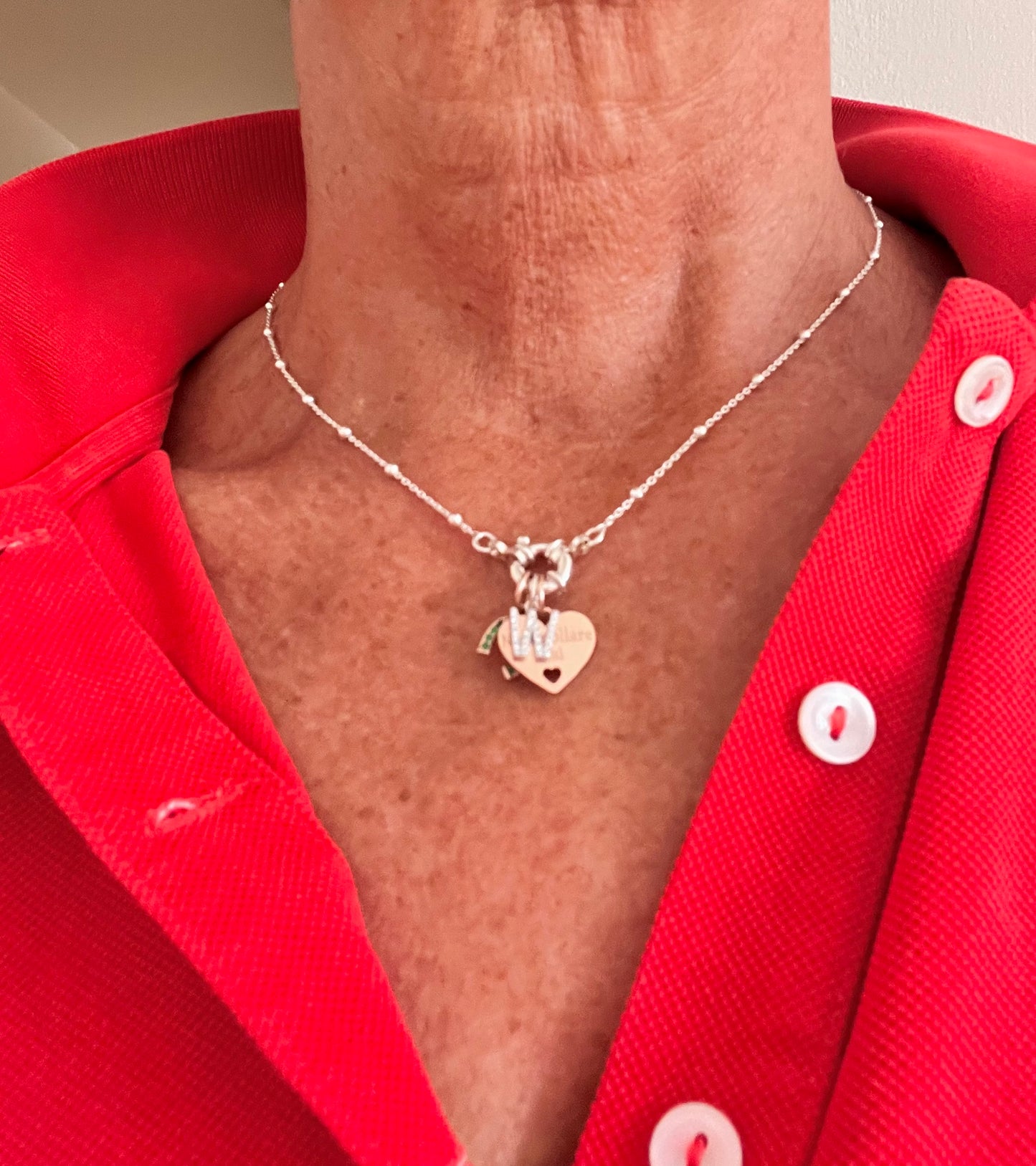 Collana con chiusura a timone e charms