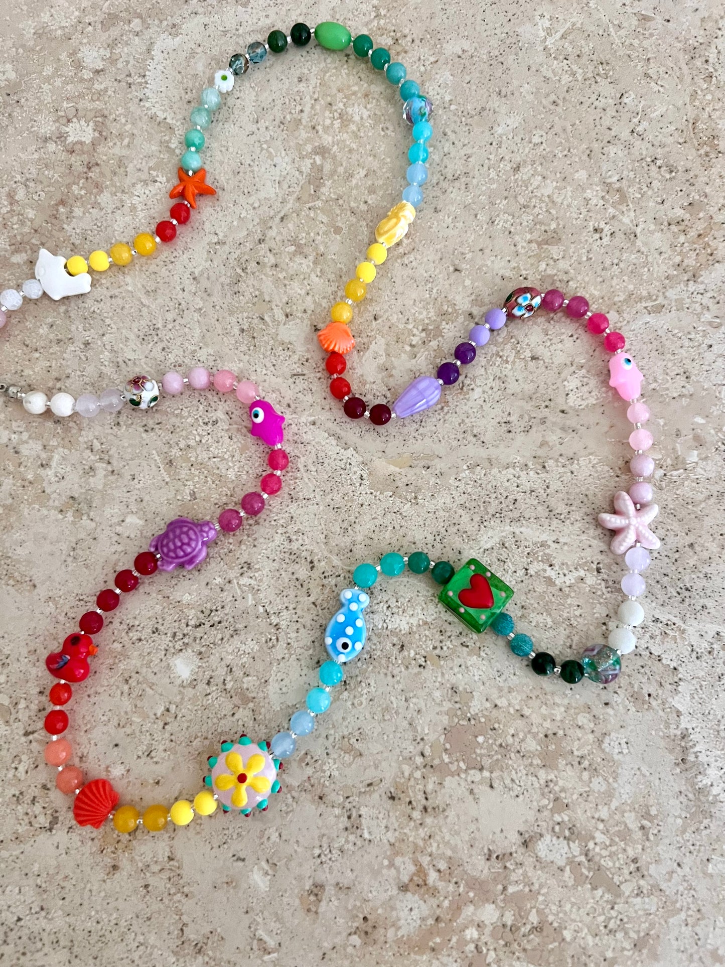 Collana di pietre naturali con elementi colori sfumati in gradazione - Filigrane & co