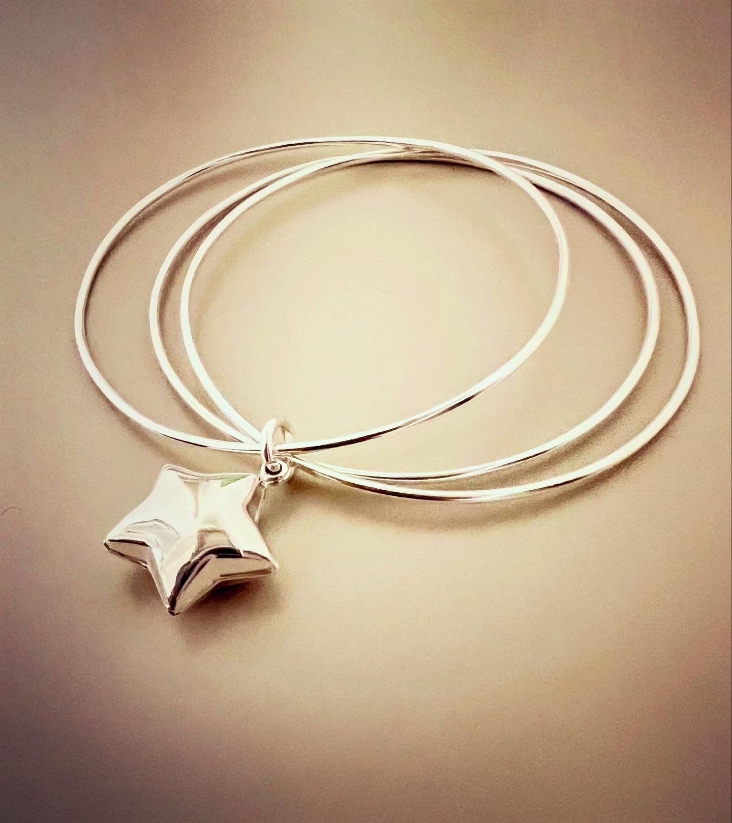 Bracciale tre cerchi sottili con stella bombata - Filigrane & co