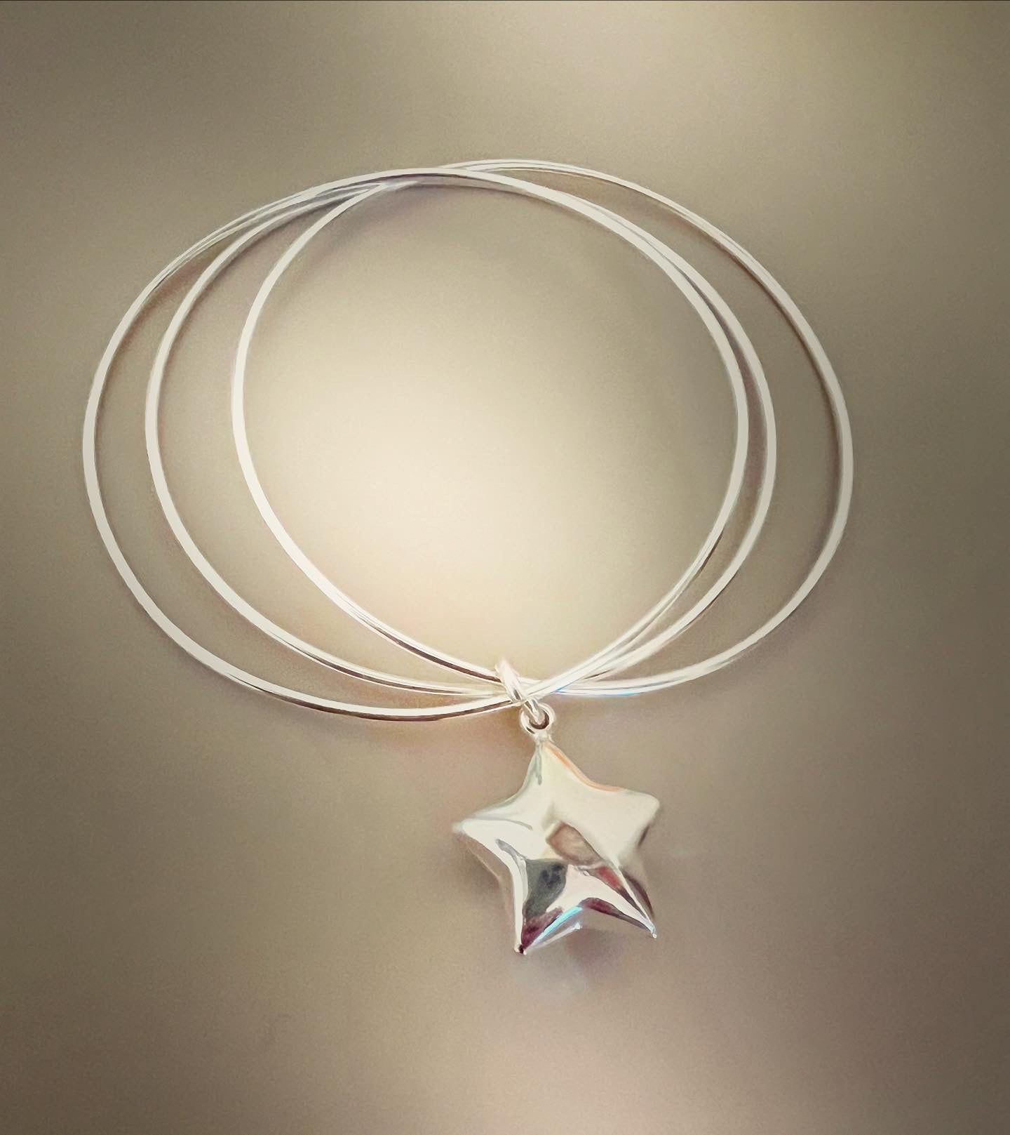 Bracciale tre cerchi sottili con stella bombata - Filigrane & co