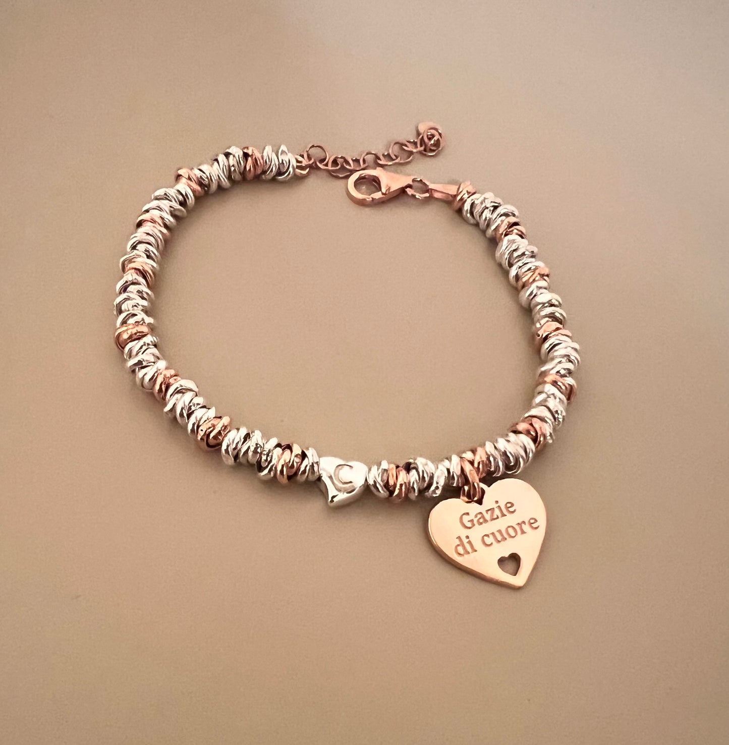 Bracciale madrina con un cuore pendente