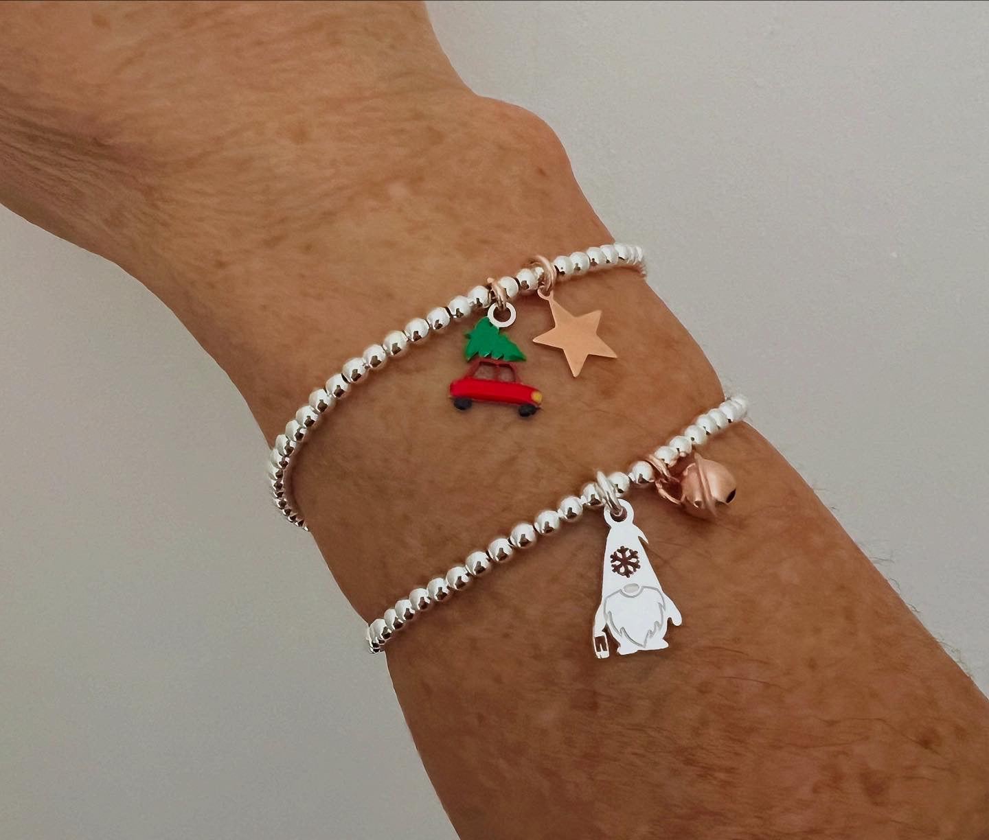 Bracciali sferette argento con ciondoli natalizi