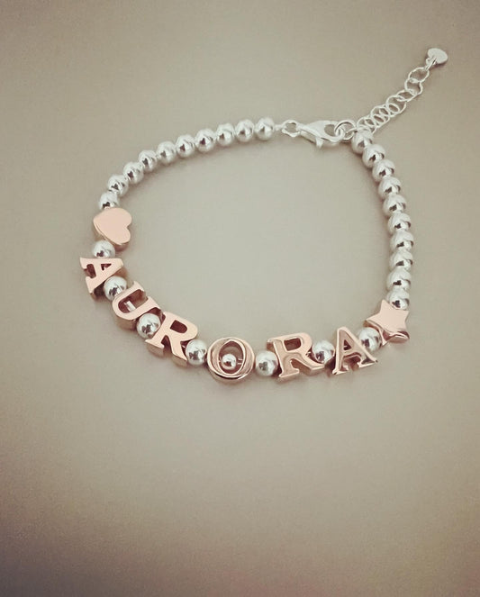 Bracciale sferette con lettere e simboli