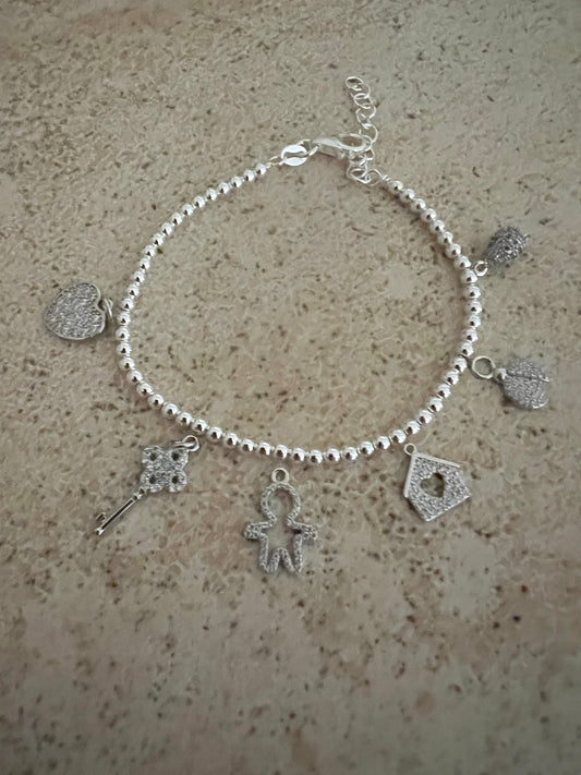 Bracciale sferette argento e 6 ciondoli