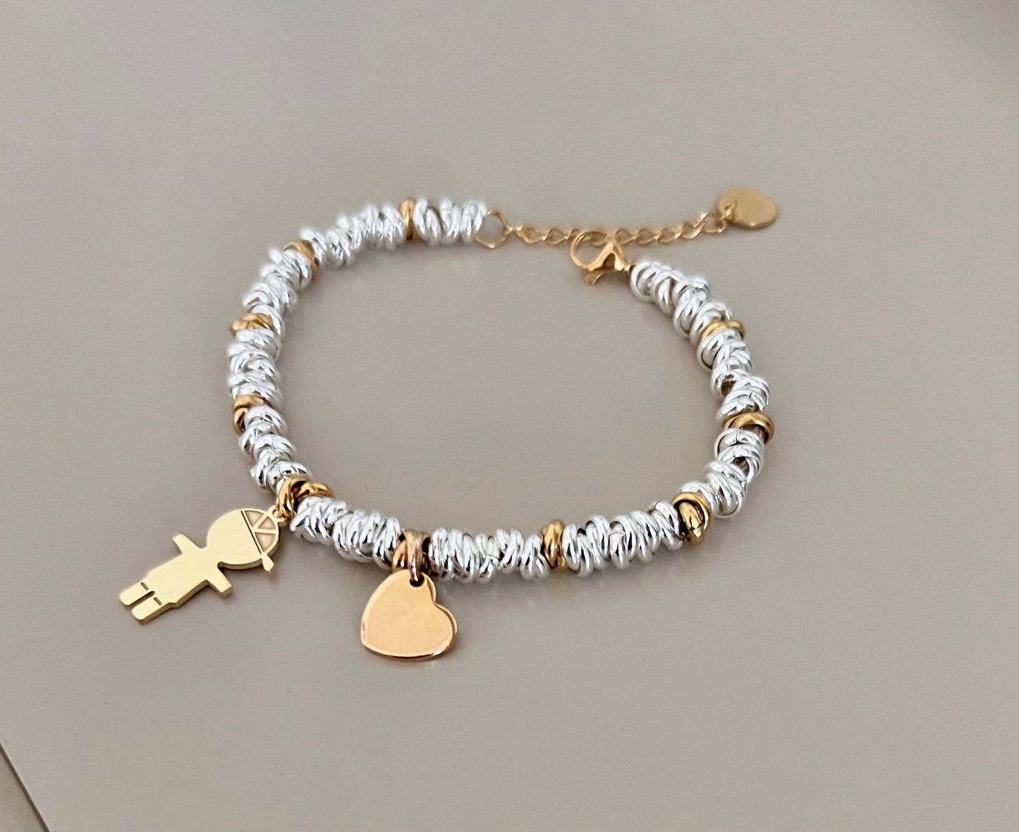 Bracciale in acciaio argentato e dorato - Filigrane & co