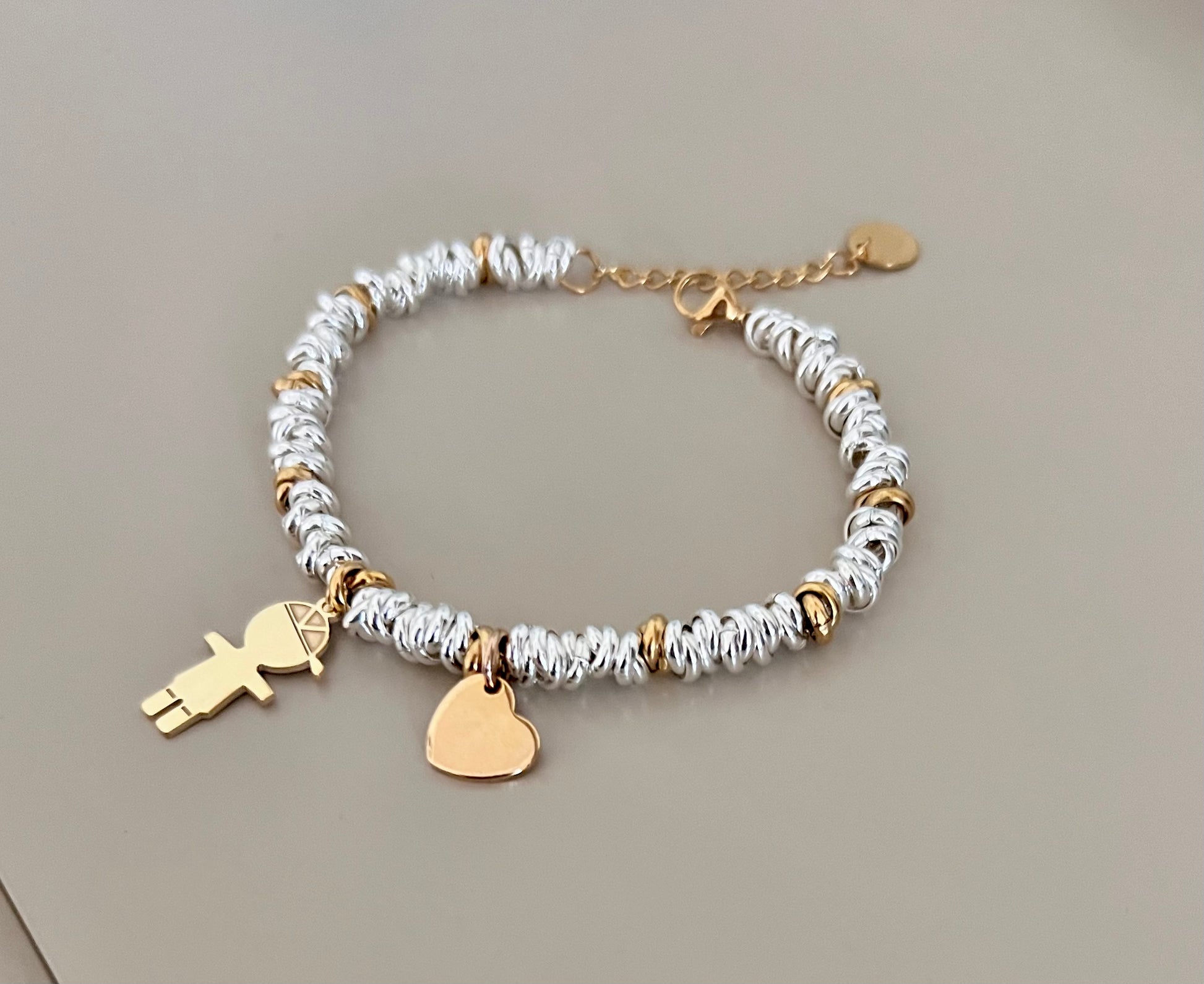 Bracciale in acciaio argentato e dorato - Filigrane & co