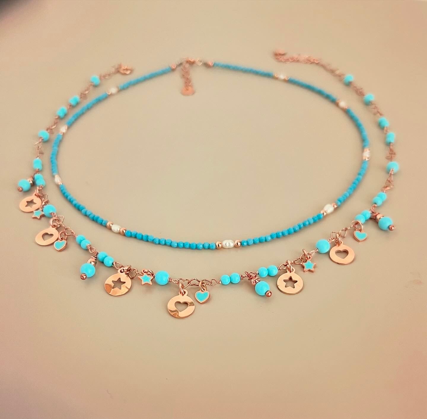 Collana turchese o corallo con charms