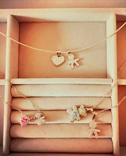 Collane girocollo con bimbo e cuore