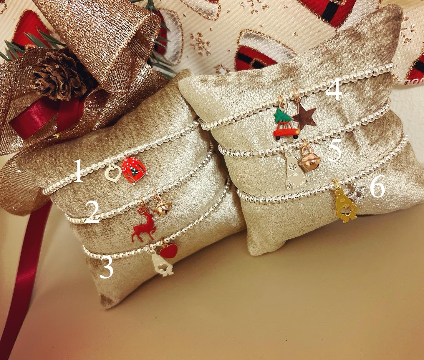 Bracciali sferette argento con ciondoli natalizi
