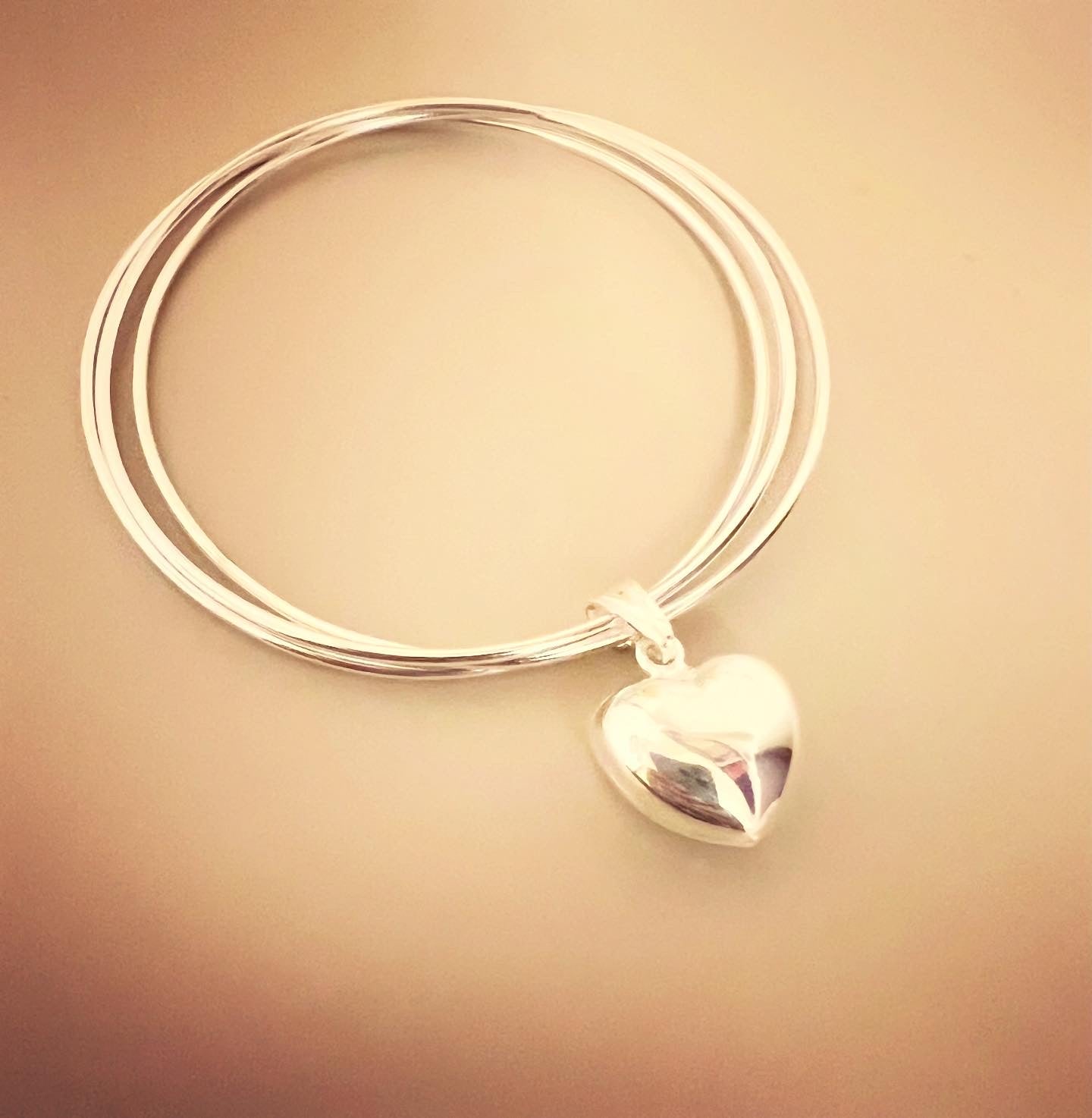 Bracciale tre cerchi sottili con stella bombata - Filigrane & co