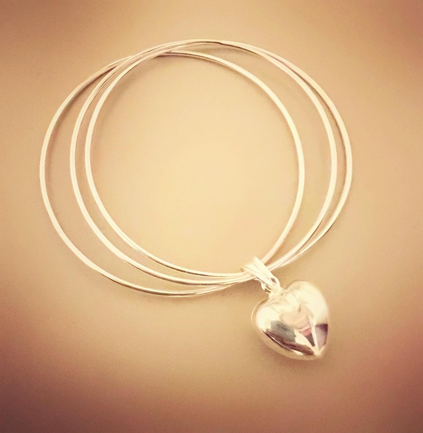 Bracciale tre cerchi sottili con stella bombata - Filigrane & co