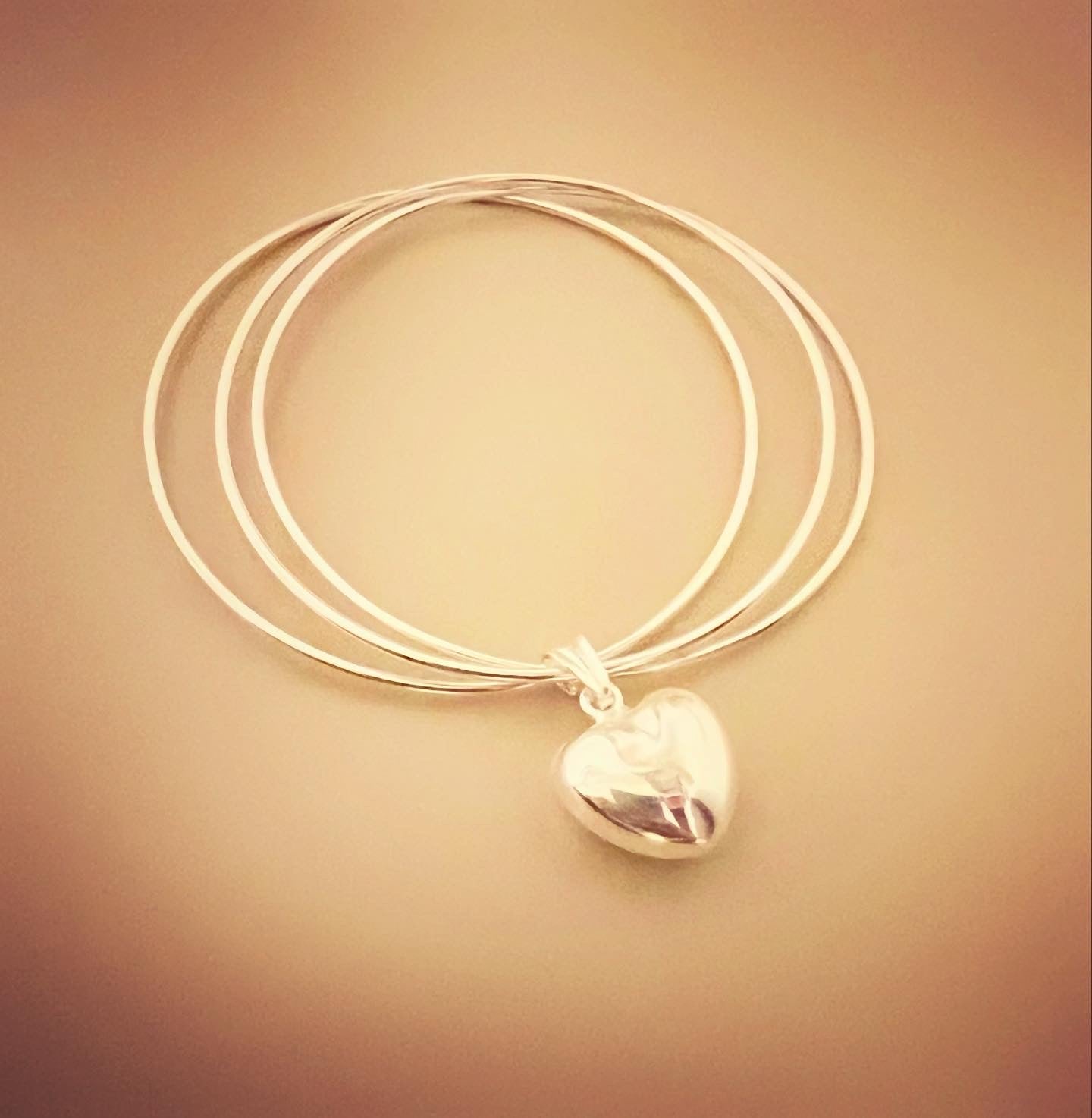 Bracciale tre cerchi sottili con stella bombata - Filigrane & co