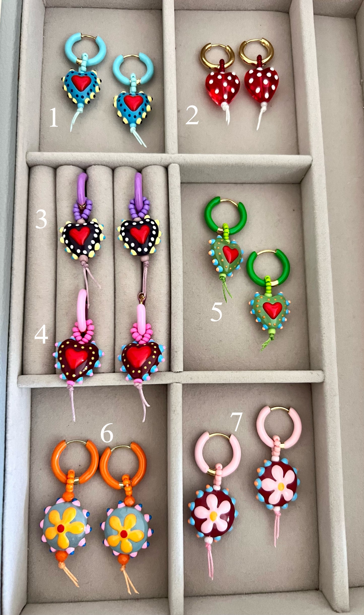 Orecchini a cerchio con cuori pendenti - Filigrane & co