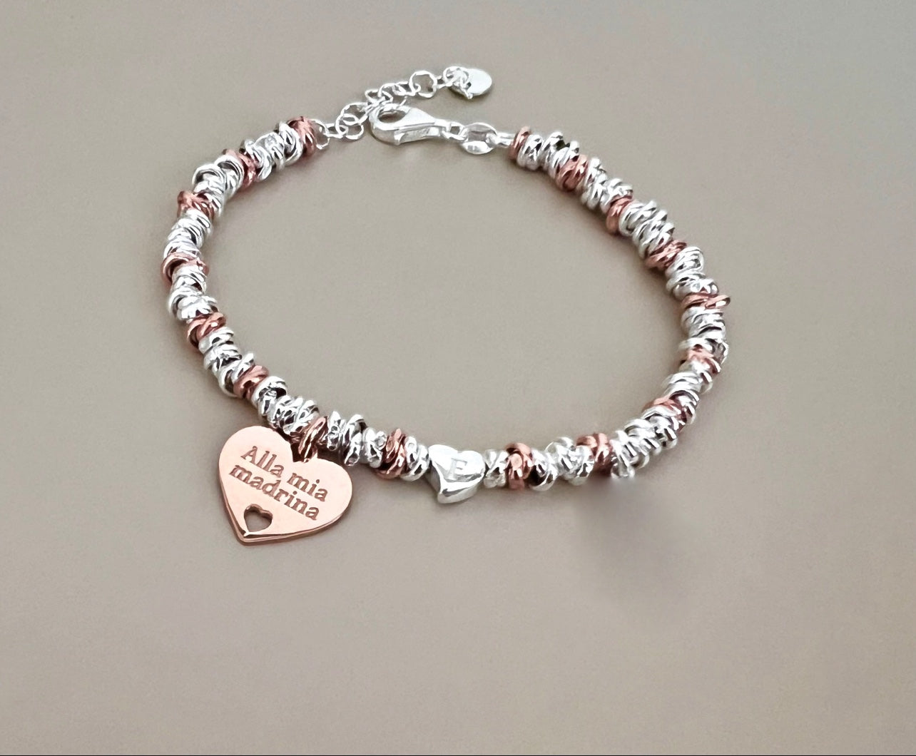 Bracciale madrina con un cuore pendente