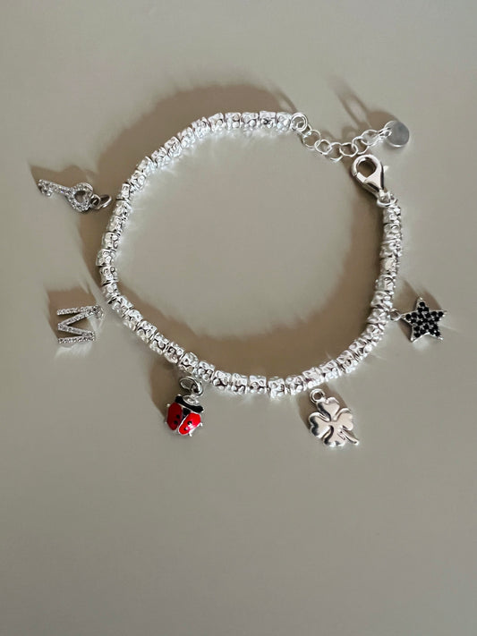 Bracciale pepite con 5 ciondoli