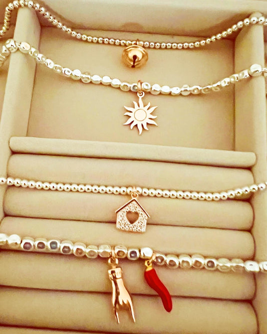 Bracciali in argento con ciondoli